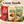 Load image into Gallery viewer, Three bags of Essential Candy Cacao Bundle hard candy are displayed on a wooden surface with chocolate pieces, cocoa powder, sliced oranges, and mint leaves. The bags are labeled Cacao Sea Salt Cayenne (red), Cacao Orange (cream), and Cacao Mint (green), with the text 'Cacao Bundle' and '3 Signature Blends' at the top.
