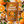 Load image into Gallery viewer, Essential Candy Orange Cinnamon bag laying flat with ingredients surrounding the bag.
