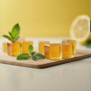 Video of Essential Candy lozenges with peppermint falling on a cutting board